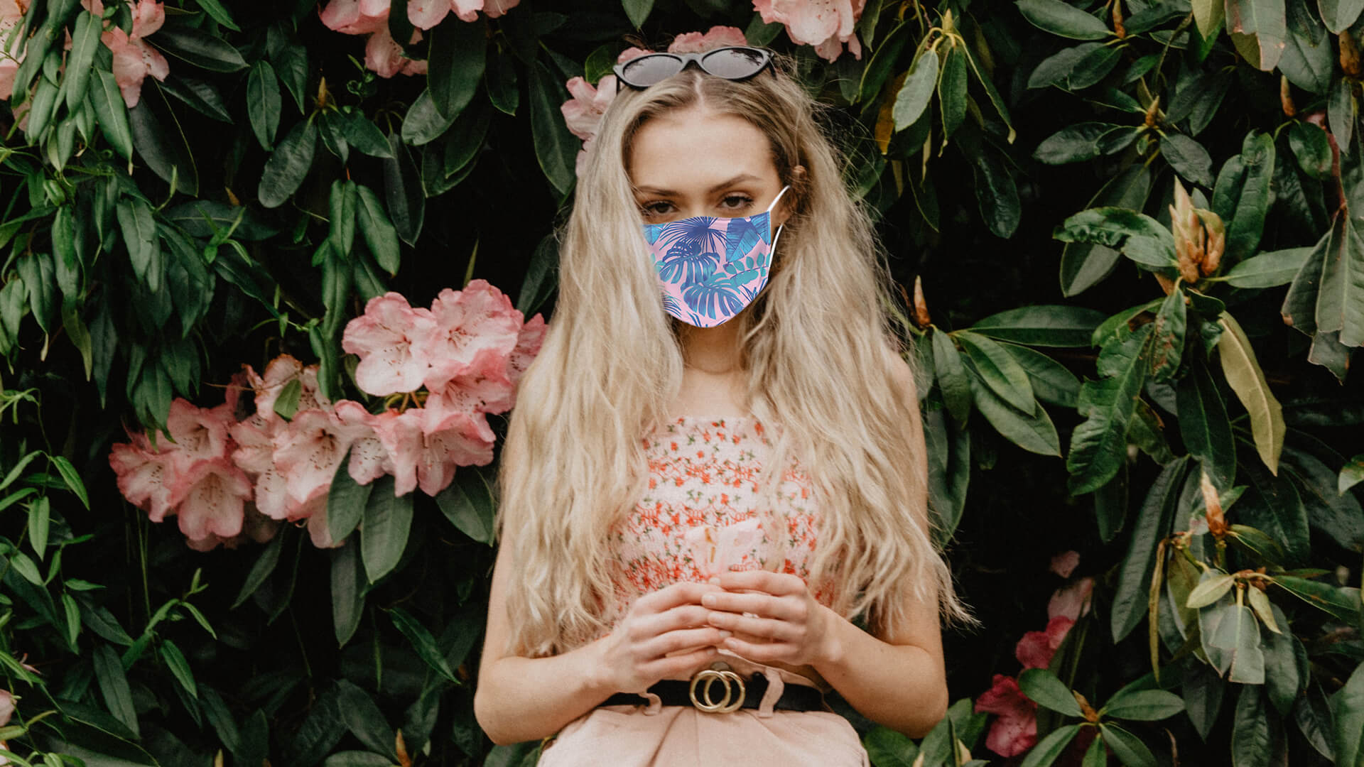 Woman wearing flower pattern face mask